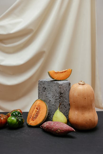 A colorful arrangement of diverse fresh fruits and vegetables representing essential nutrients for optimal human health and wellness.
